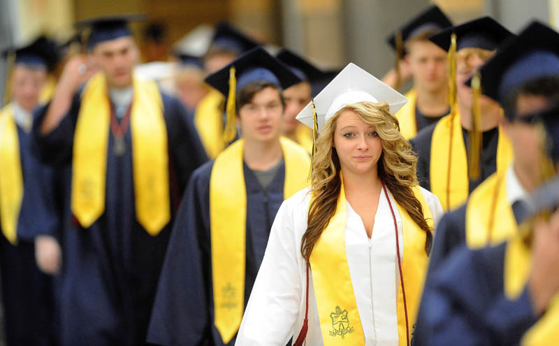 Mt. Blue High School's class of 2013 make their way to commencement ceremonies in Farmington on Saturday..