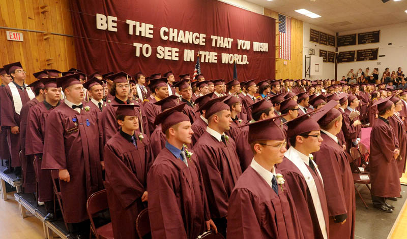 Nokomis High School's class of 2013 take their seats during commencement ceremonies in Newport on Friday.