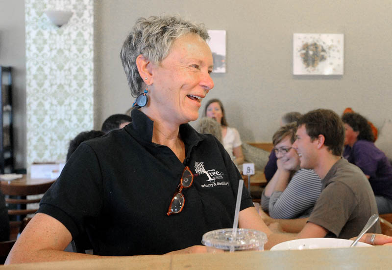 Waterville Mayor Karen Heck, left, chats with a friend during lunch at Selah Tea in downtown Waterville on Friday.
