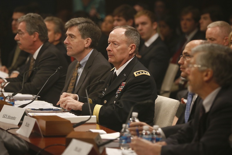 From left, Deputy Attorney General James Cole; National Security Agency (NSA) Deputy Director Chris Inglis; NSA Director Gen. Keith B. Alexander; Deputy FBI Director Sean Joyce; and Robert Litt, general counsel to the Office of the Director of National Intelligence; prepares to testify on Capitol Hill in Washington, Tuesday, June 18, 2013, before the House Intelligence Committee hearing regarding NSA surveillance. (AP Photo/Charles Dharapak)
