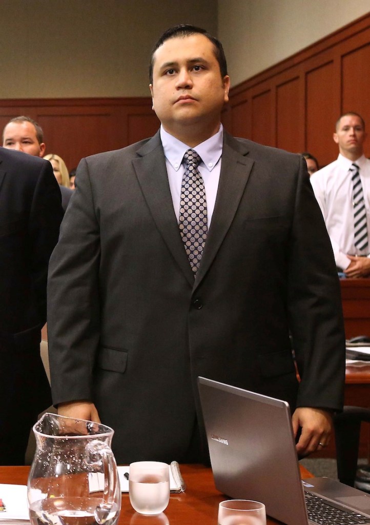 George Zimmerman stands as judge Debra Nelson arrives in Seminole circuit court for his trial, in Sanford, Fla., Monday, June 24, 2013. Zimmerman has been charged with second-degree murder for the 2012 shooting death of Trayvon Martin. (AP Photo/Orlando Sentinel, Joe Burbank, Pool)