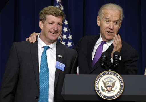 Vice President Joe Biden stands with former Rhode Island Rep. Patrick Kennedy as he speaks at the closing of the National Conference on Mental Health on June 3, 2013, in Washington.