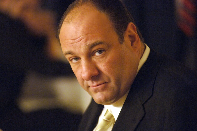 This undated publicity photo, released by HBO, shows actor James Gandolfini in his role as Tony Soprano, head of the New Jersey crime family portrayed in HBO's "The Sopranos." HBO and the managers for Gandolfini say the actor died Wednesday, June 19, 2013, in Italy. He was 51. (AP Photo/HBO, Barry Wetcher, File)