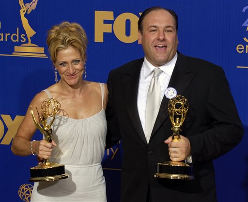 In this Sept. 21, 2003, photo, Edie Falco and James Gandolfini hold the awards they won for outstanding lead actress and actor in a drama series for their work on "The Sopranos" at the 55th Annual Primetime Emmy Awards in Los Angeles.