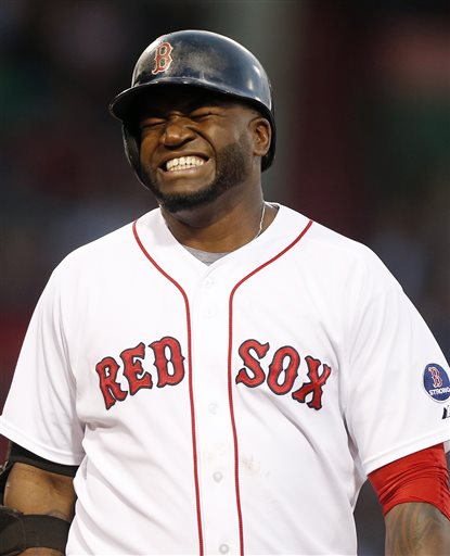 Boston Red Sox's David Ortiz reacts after flying out in the fourth inning of a baseball game against the Tampa Bay Rays in Boston, Wednesday, June 19, 2013. (AP Photo/Michael Dwyer)
