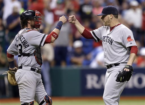 Boston Red Sox relief pitcher Andrew Bailey, right, celebrates with catcher Jarrod Saltalamacchia after closing out the Tampa Bay Rays during the ninth inning of a baseball game on Wednesday, June 12, 2013, in St. Petersburg, Fla. The Red Sox won the game 2-1. (AP Photo/Chris O'Meara) Tropicana Field;Tampa Bay Rays