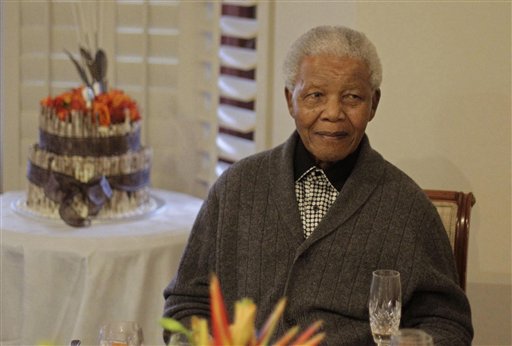 Former South African President Nelson Mandela celebrates his 94th birthday with family in Qunu, South Africa, on July 18. Mandela was taken to a hospital Saturday to be treated for a recurrence of a lung infection and is in "serious but stable" condition, the president's office said.