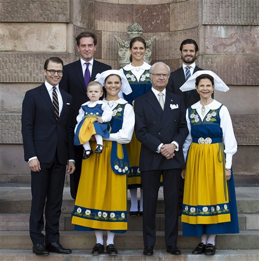 The Swedish Royal family, from left to right, Prince Daniel, Chris O'Neill, Princess Estelle, Crown Princess Victoria, Princess Madeleine, King Carl Gustaf, Prince Carl Philip and Queen Silvia pose for a family photo during the Swedish National Day celebrations at the Royal Palace in Stockholm on Thursday.