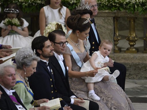 From right, Sweden's King Carl Gustaf, Queen Silvia, Crown Princess Victoria with Princess Estelle, Prince Daniel and Prince Carl Philip attend the wedding ceremony of Princess Madeleine and Christopher O'Neill at the Royal Chapel in Stockholm on Saturday.