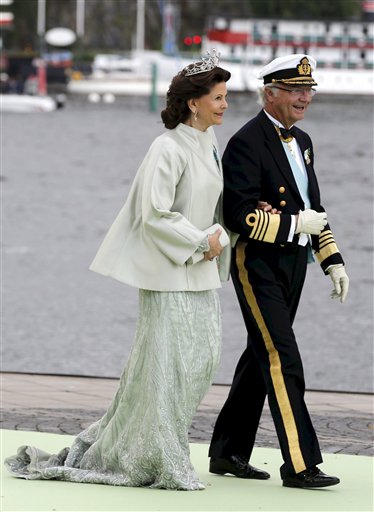Queen Silvia and King Carl Gustaf of Sweden leave for a boat trip to Drottningholms Castle after the wedding ceremony of Princess Madeleine of Sweden and Christopher O'Neill at the royal chapel in Stockholm on Saturday.