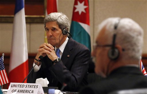 U.S. Secretary of State John Kerry and President of Syrian Opposition Coalition George Sabra attend a meeting in Amman, Jordan, on May 22.