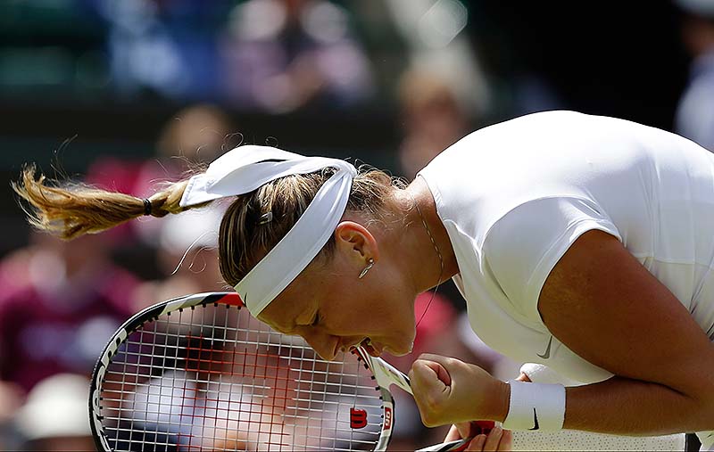 Petra Kvitova celebrates after beating Ekaterina Makarova Saturday at Wimbledon.