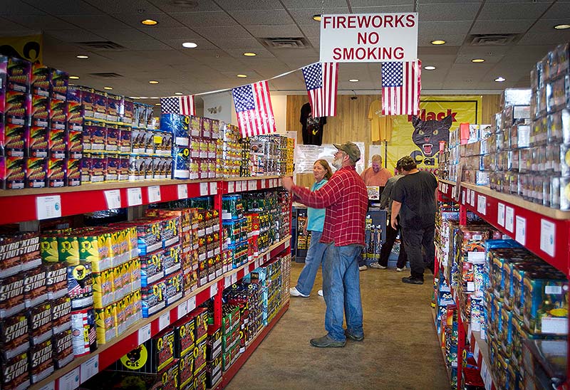 Fireworks fill the shelves at a Pyro City retail store in Winslow. Sales at Maine’s fireworks stores have far surpassed initial projections when fireworks became legal last year for the first time in 63 years.