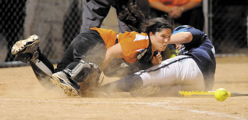 Gardiner catcher Steph Plourde, left, drops the ball in a collision with Oceanside's Kannadi Grover in the sixth inning of the Eastern Class B regional final Thursday at Brewer High School.