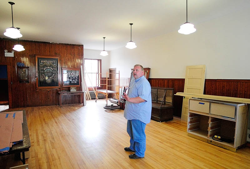 Assistant Fire Chief Jeff Thompson discusses renovations in the meeting room at the Hallowell Fire Station on Tuesday.