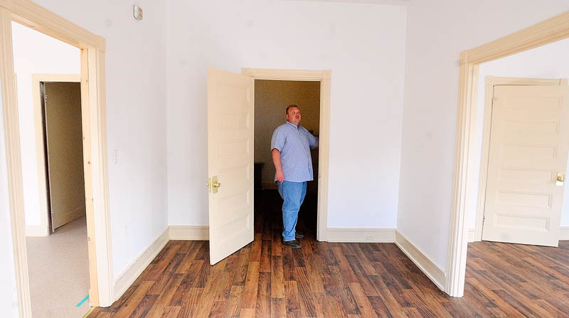 Assistant Fire Chief Jeff Thompson discusses renovations in the second-floor apartment at the Hallowell Fire Station on Tuesday.