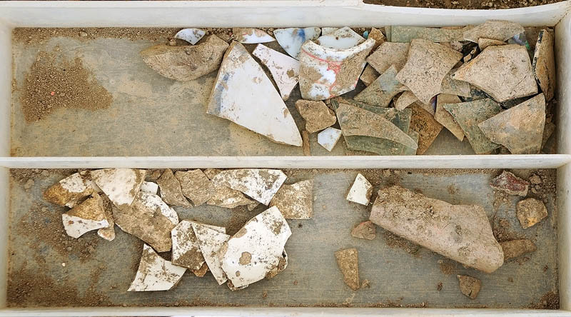 A tray holds items uncovered during an archeological dig on Tuesday at the Fort RIchmond site, near the Kennebec River in RIchmond.
