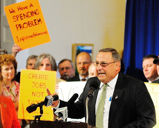 Gov. Paul LePage speaks during a rally on Thursday June 20, 2013 in the Hallo of Flags at the State House in Augusta.