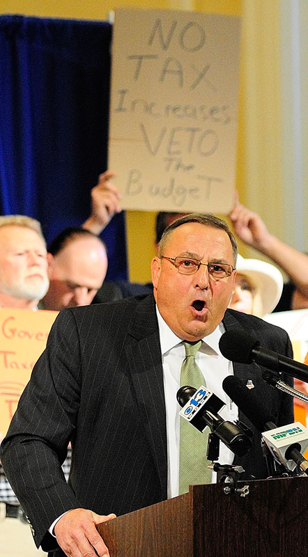 Gov. Paul LePage speaks during a rally on Thursday June 20, 2013 in the Hallo of Flags at the State House in Augusta.