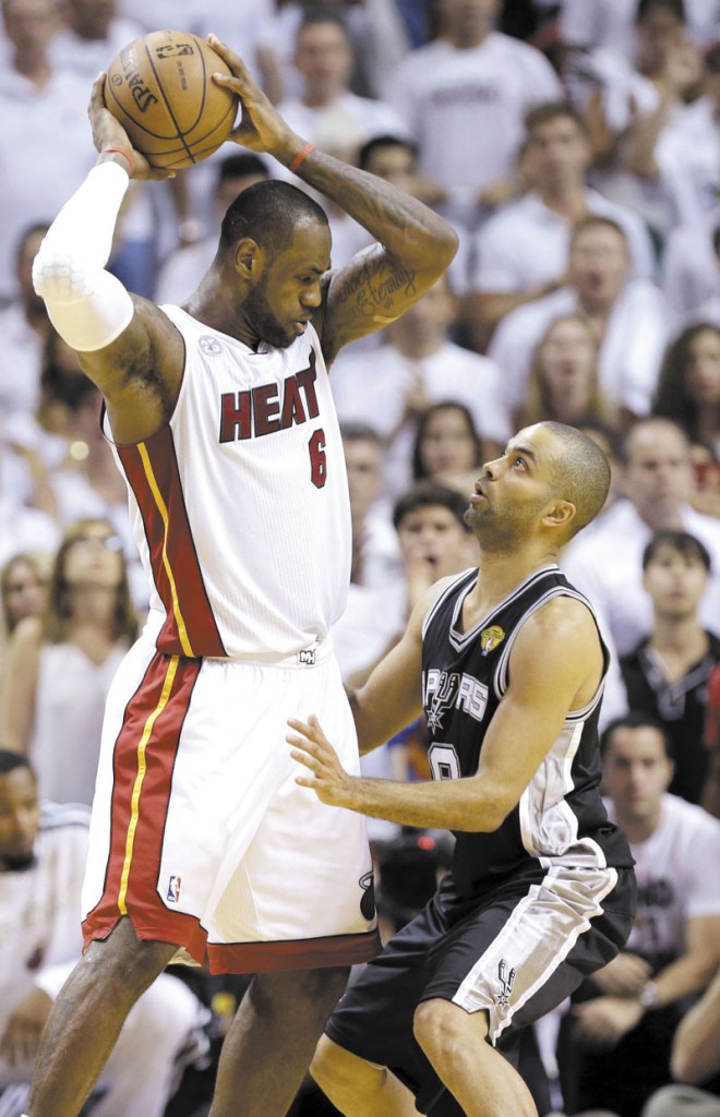 FOR ALL THE MARBLES: LeBron James, left, and the Miami Heat face Tony Parker and the San Antonio Spurs in Game 7 of the NBA Finals tonight in Miami.