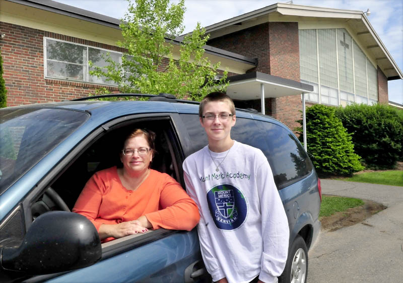 Linda Theberge, of Madison, and her son, Ryan, outside the Mount Merici Academy in Waterville on Thursda. Linda Theberge has logged more than 300,000 miles transporting Ryan and other kids to school for 25 years.