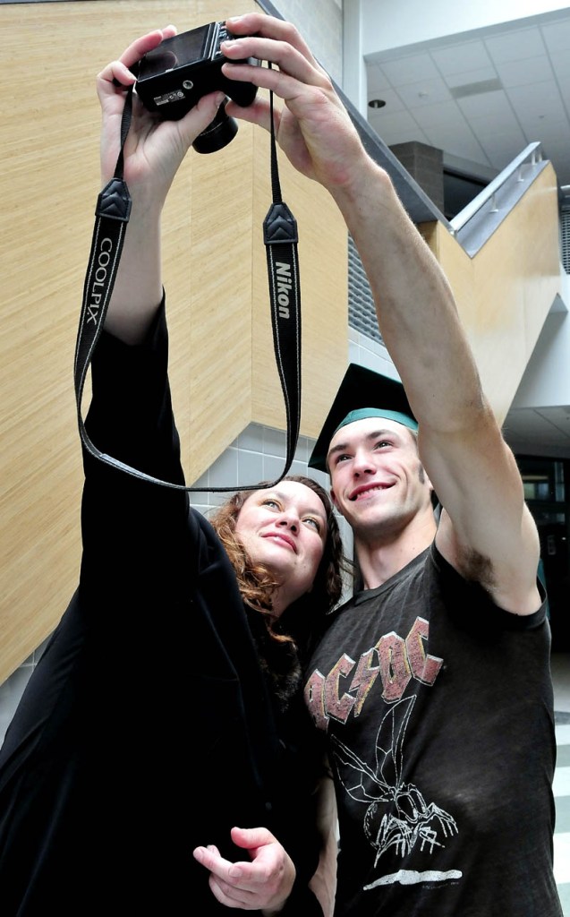 Mount View High School graduate Noah LaForge and his mother, Terri, take a self portrait prior to commencement in Thorndike on Saturday.