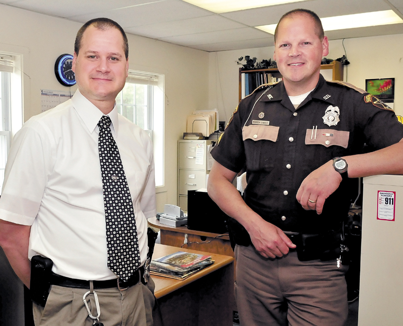 Steve Charles, left, and his brother, Ken, have been promoted to detectives for the Franklin County Sheriff's Department in Farmington on Thursday.