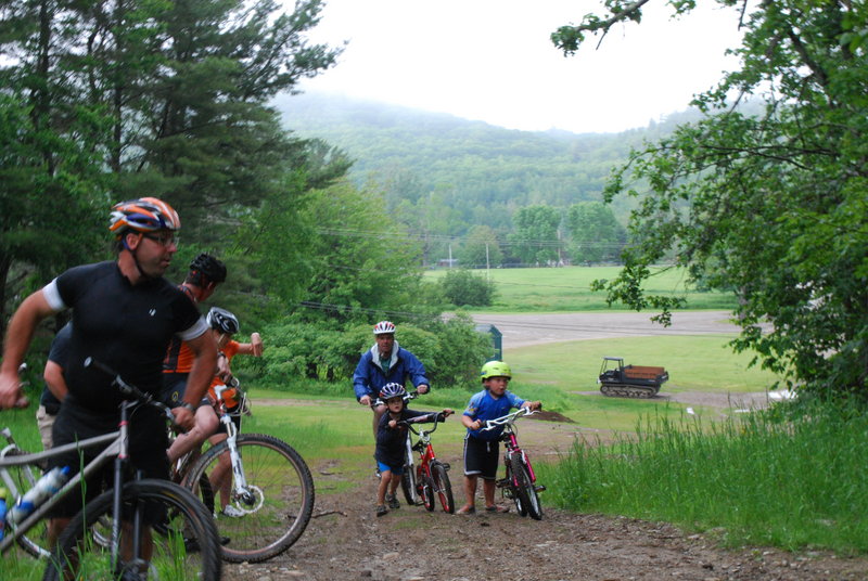 Participants in a free mountain biking camp for kids make their way up a hill at the Ragged Mountain Recreation Area in Camden. The camp was revived by Casey Leonard, who is coach of the Camden High School mountain bike team and father of an enthusiastic 5-year-old mountain biker.