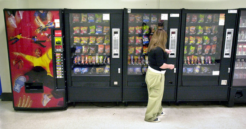 The new federal rules on snacks sold at schools take effect in the 2014-15 year.