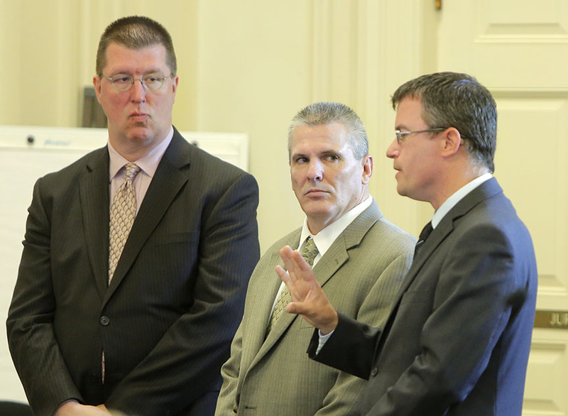 Michael Swenson, center, pleaded guilty Friday in York County Superior Court in Alfred to killing his friend Robert White in Old Orchard Beach in April 2012. With Swenson are his lawyers Joseph Mekonis, left, and Randall Bates.