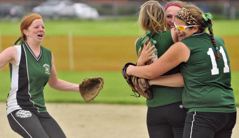 WE DID IT: Winthrop’s Danielle Pease, left, runs in to hug teammates Krissy Doughty, Abby Helm and Alyssa Arsenault after the Ramblers beat Hall-Dale 3-2 in a Western Class C quarterfinal game Thursday in Farmingdale.