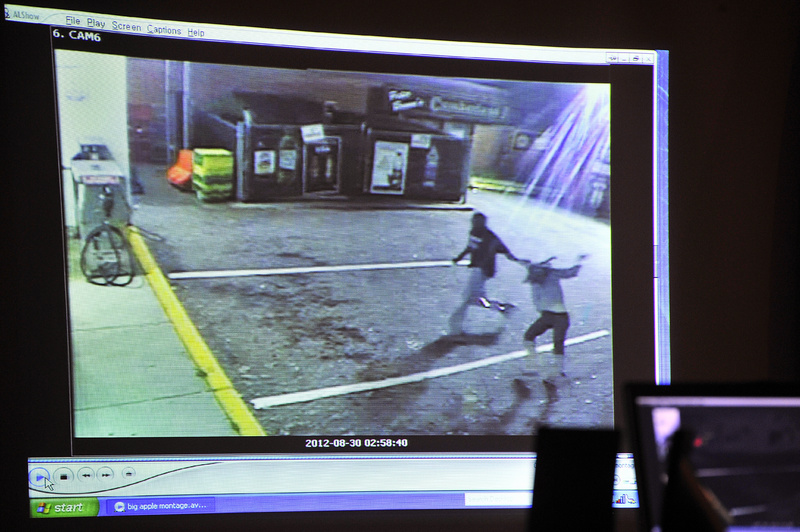 The prosecution in Eric Gwaro's attempted murder trial aired a video from a Big Apple store showing a man pulling a woman across the parking lot to behind the Cumberland Garage in Portland.