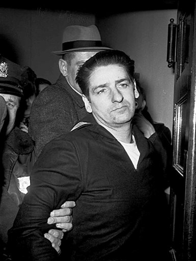 This Feb. 25, 1967, photo shows self-confessed Boston Strangler Albert DeSalvo minutes after his capture in Boston. DeSalvo confessed to the string of 1960s killings but was never convicted. He died in prison in the 1970s.