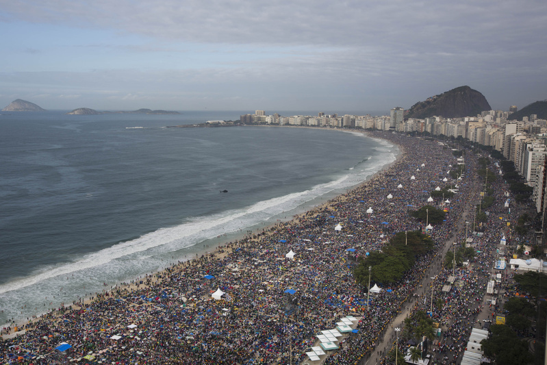 People pack Copacabana beach for Pope Francis' Mass on Sunday in Rio de Janeiro, Brazil. .