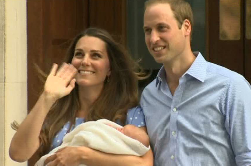 In this image from video, the Duke and Duchess of Cambridge leave St. Mary's Hospital in London on Tuesday carrying their newborn son into public view for the first time. The boy will be third in line to the British throne.