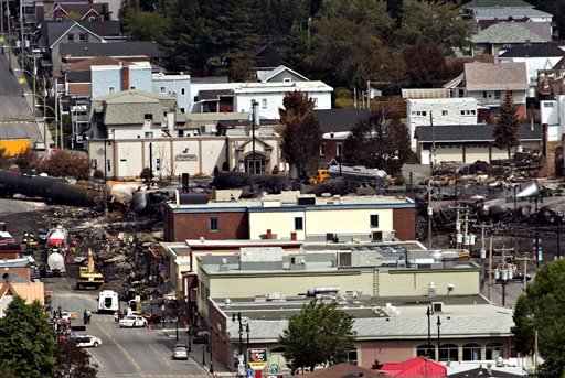 The investigation continues on Wednesday in Lac-Megantic, Quebec, where searchers have recovered at least 15 bodies from the wreckage so far, but they are so badly burnt that authorities have not been able to identify them.