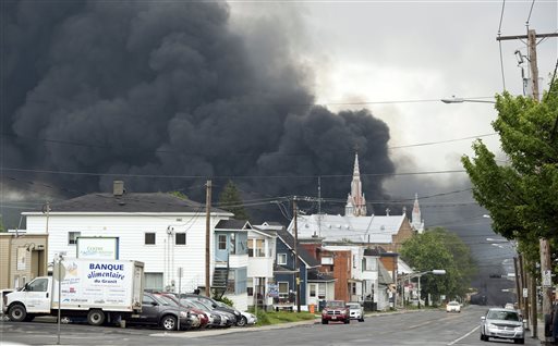 A view of Lac-Megantic around noon with smoke still rising from the train derailment. Canada