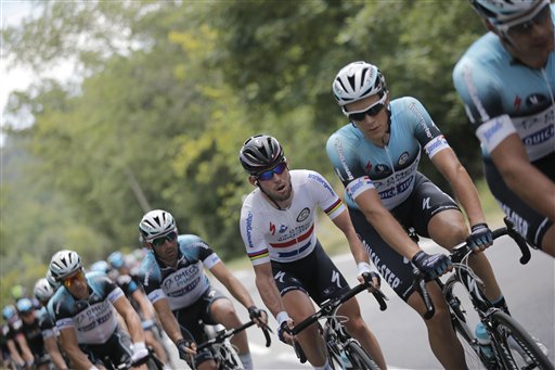 Stage winner Mark Cavendish of Britain, center in white, and his teammates lead the pack as they chase after the breakaway group during the fifth stage of the Tour de France on Wednesday.