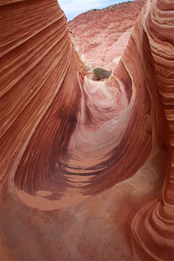 This May 28, 2013, photo shows a section of a rock formation known as The Wave in the Vermilion Cliffs National Monument in Arizona.