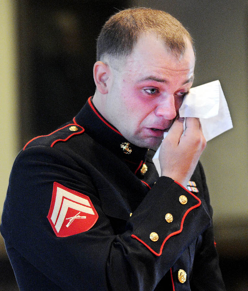 Clad in a Marine Corps dress uniform, Travis Lawler, 23, formerly of Oakland, cries before being sentenced today to nine years in prison, all but four yeas suspended, and four years' probation, at Kennebec County Superior Court, for convictions related to a June 2012 drunk driving accident that killed his sister, Kristin Lawler, 20, of Oakland, and her boyfriend, Jackson Bolduc, 25, of Belgrade.