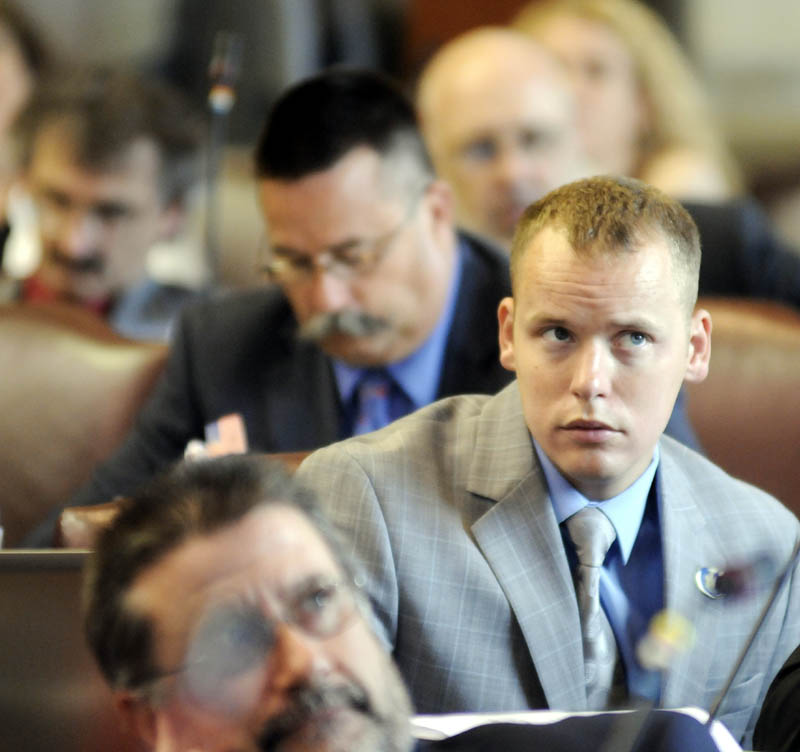 Rep. Corey Wilson, R-Augusta, watches the vote June 26 in the House of Representatives to override Gov. Paul LePage's veto of the state budget. Wilson was one of several Republicans who voted to overturn the veto.