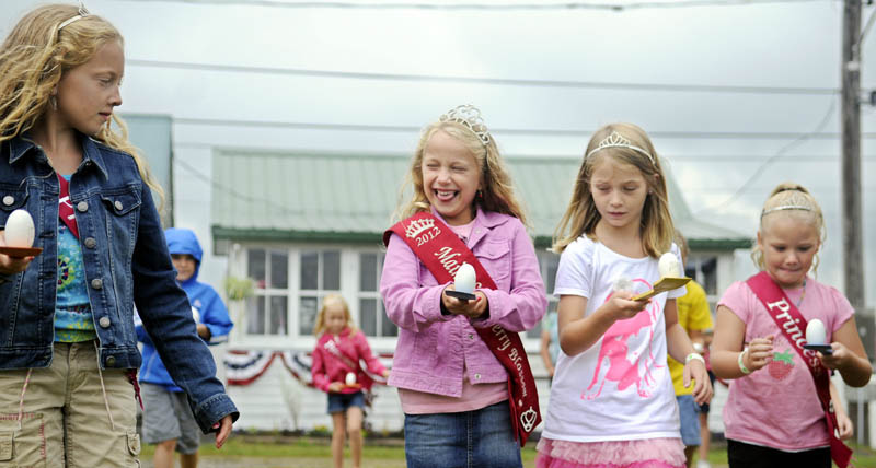 Children compete in the egg and spoon contest today, on the fourth and final day of the Pittston Fair. Volunteers, sponsors and vendors reported good attendance this year for the annual agricultural event.