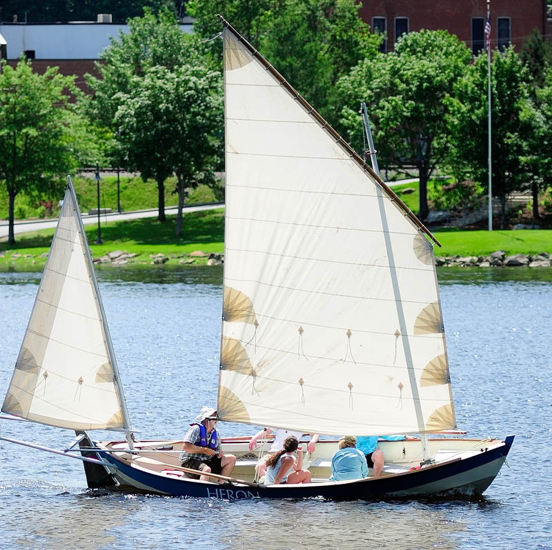 A sailboat in the Kennebec River goes past the Gardiner landing on Saturday, near where the Cobbossee Stream joins the river. There was a light breeze on the hot sunny afternoon.