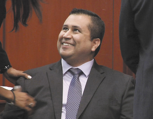 George Zimmerman smiles after a not guilty verdict was handed down in his trial at the Seminole County Courthouse in Sanford, Fla. Neighborhood watch captain George Zimmerman was cleared of all charges Saturday in the shooting of Trayvon Martin, the unarmed black teenager whose killing unleashed furious debate across the U.S. over racial profiling, self-defense and equal justice.