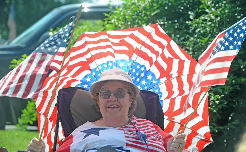 Jane Cochran, of Winslow, waits for the annual Winslow Family 4th of July Celebration parade in Winslow Thursday.