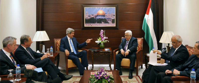U.S. Secretary of State John Kerry, center left, meets with Palestinian President Mahmoud Abbas, center right, on Friday, in the West Bank city of Ramallah.