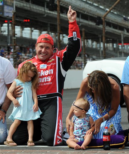 Ryan Newman, second from left, celebrates with his wife, Krissie, and daughters, Brooklyn, left, and Ashlyn, after winning the Brickyard 400 Sunday at the Indianapolis Motor Speedway.