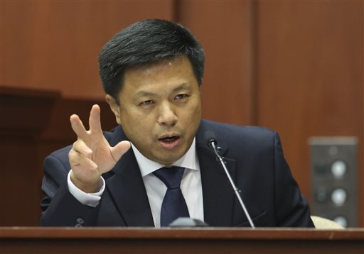 Volusia and Seminole County associate medical examiner Shiping Bao MD testifies during George Zimmerman's trial in Seminole circuit court, Friday, July 5, 2013 in Sanford, Fla. Zimmerman has been charged with second-degree murder for the 2012 shooting death of Trayvon Martin.