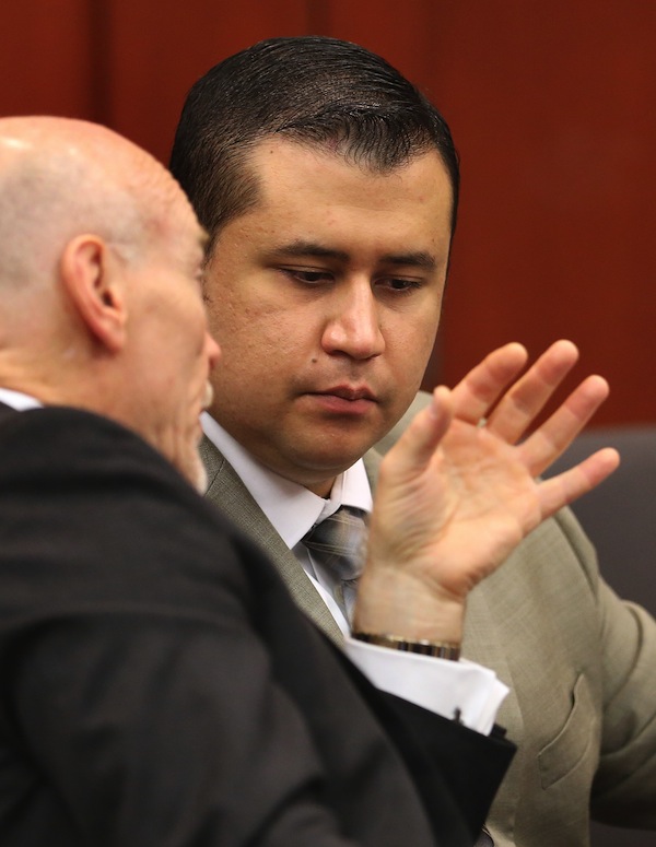 George Zimmerman listens to defense counsel Don West during his trial in Seminole Circuit Court, in Sanford, Fla., Tuesday, July 9, 2013. Zimmerman is charged with second-degree murder in the fatal shooting of Trayvon Martin, an unarmed teen, in 2012. (AP Photo/Orlando Sentinel, Joe Burbank, Pool)