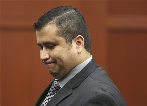 George Zimmerman leaves the courtroom during a recess in his trial in Seminole circuit court in Sanford, Fla., Wednesday.